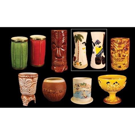 A COLLECTION OF NINE (9) TIKI MUGS FROM TRADER VICS