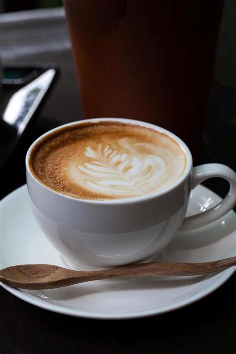 Close-up latte art coffee 11043666 Stock Photo at Vecteezy