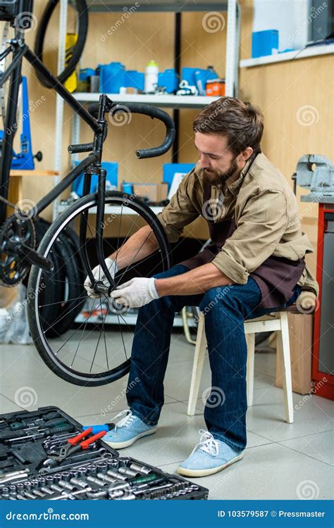 Repairing wheel of bicycle stock image. Image of toolbox - 103579587