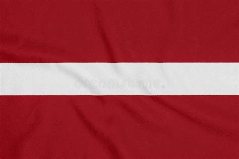 Flag of Latvia on Textured Fabric. Patriotic Symbol Stock Photo - Image ...