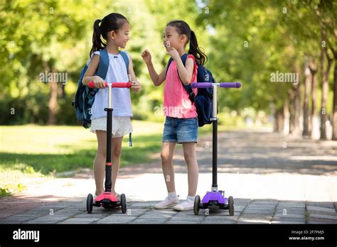 Happy children playing outdoors Stock Photo - Alamy