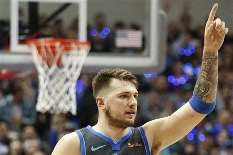 Watch: Mavs rookie Luka Doncic pulls off circus shot, triple-double vs ...