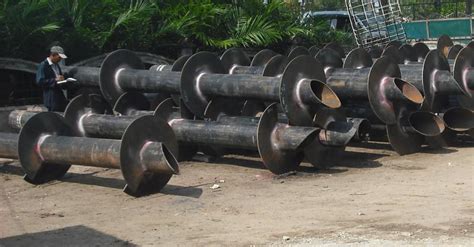 TerraTorque Inc - Helical Piling Large Helical (screw) Piling Installing Helical (screw) Piles ...