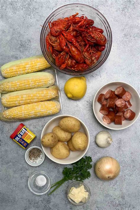 Louisiana Crawfish Boil Recipe with Garlic Butter Sauce - IzzyCooking