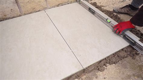 How to lay porcelain tiles outside: update your plot with this step-by-step guide | Gardeningetc