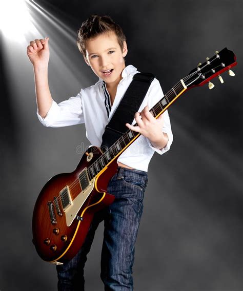 Boy Playing On Electric Guitar On The Stage Stock Image - Image of single, stage: 36431447