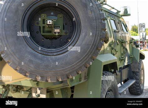 Gidran modern military camouflage 4x4 MRAP with spare wheel Stock Photo - Alamy