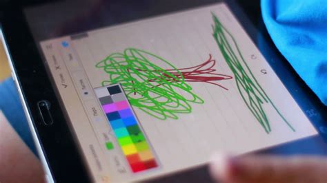 Drawing with a finger on a digital touchscreen tablet device 13551854 ...