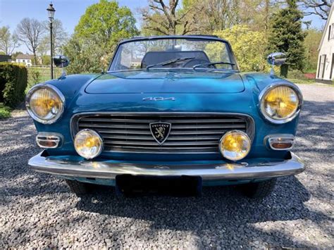 For Sale: Peugeot 404 Convertible (1964) offered for GBP 42,913