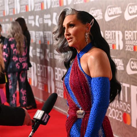 Michelle Visage wearing Union Jack gown at BRITs in tribute to Geri ...