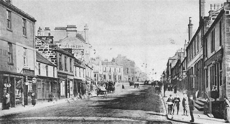 Photographs and map of Airdrie: Clock Tower, Town Centre, Savings Bank, Public Library, Wellwynd ...