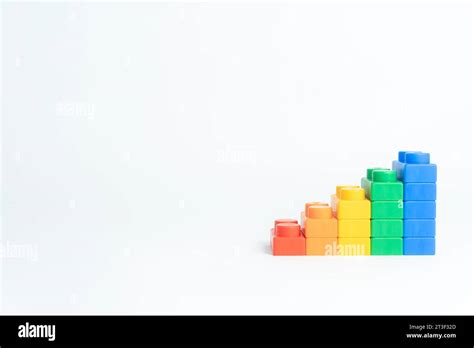 Many toy blocks in different colors on white background Stock Photo - Alamy