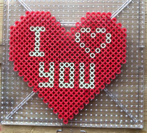 Excited to share the latest addition to my #etsy shop: #Valentine'sDay #heart perler beads (glow ...