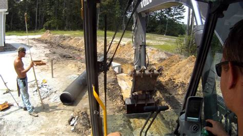 Excavator Trenching For Pipe - YouTube