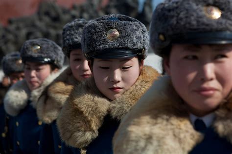 Global Musings — Female North Korean traffic police officers gather...