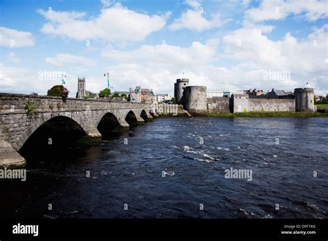 A bridge crossing river shannon and king john's castle;Limerick county ...