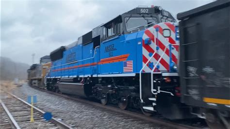 New Metra 502 SD70MACH on M542 by the Searchlights on the CC Sub at Springlake, in Ryland ...