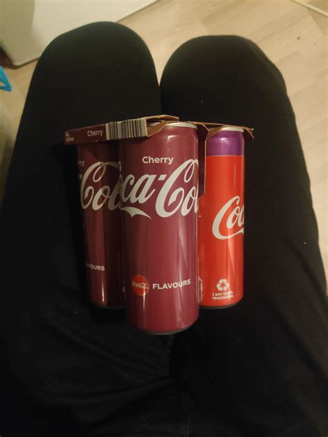 My 4-pack of cherry coke has two cans of the old design, and 2 cans of ...