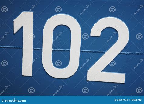 Number 102 On A Metallic Blue Surface. Stock Images - Image: 34557434