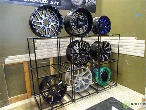 (8) Display Wheels with Rack - Roller Auctions