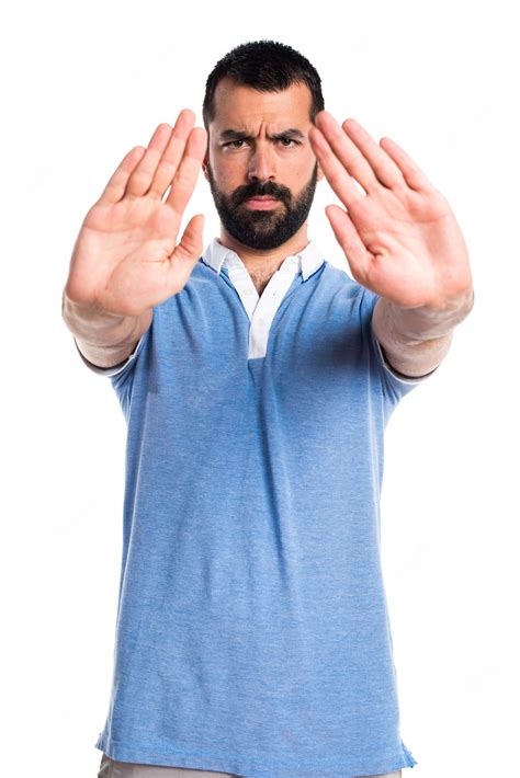 Free Photo | Man with blue shirt making stop sign