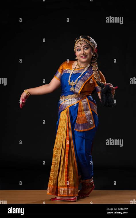 Kuchipudi dancer portraying Goddess Satyabhama wife of Lord Krishna walking on stage Stock Photo ...