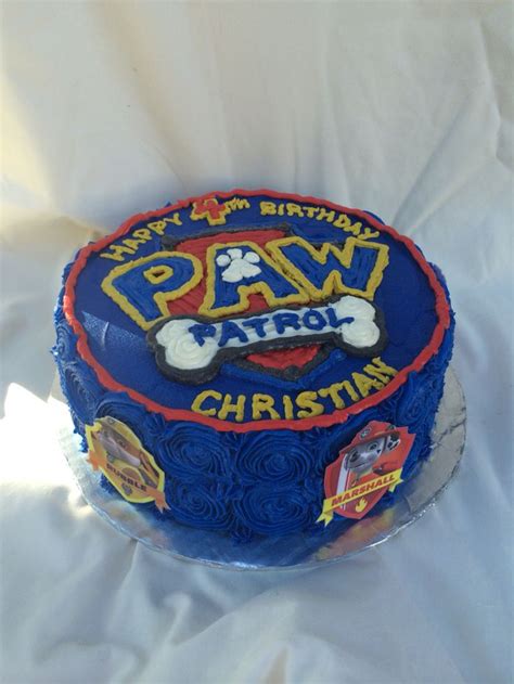 a birthday cake with a dog's paw on top and the words paw nation ...