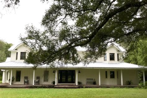 Exterior Updates: Our White Farmhouse with a Metal Roof - Daly Digs