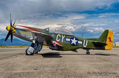 The 1944 North American P-51D Mustang known as "Gunfighter" sits on the ...