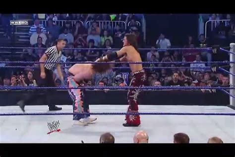 Carlito counters a suplex with a backstabber, before hitting the ground ...