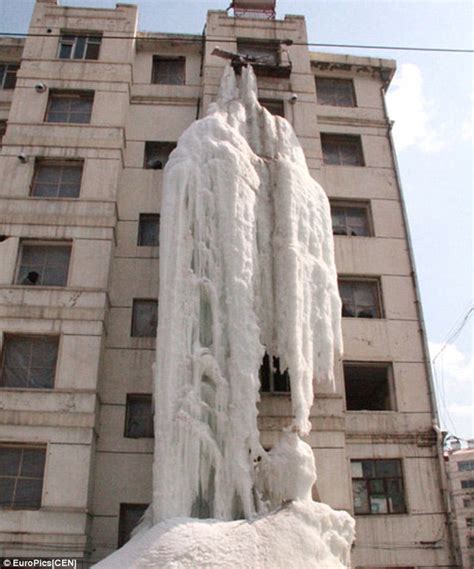 Spectacular frozen waterfall created in China by resident, 58, who left ...