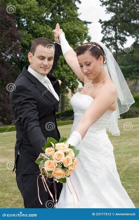 Wedding Couple Rise Arms Together Stock Photo - Image of relationship, holding: 23177512