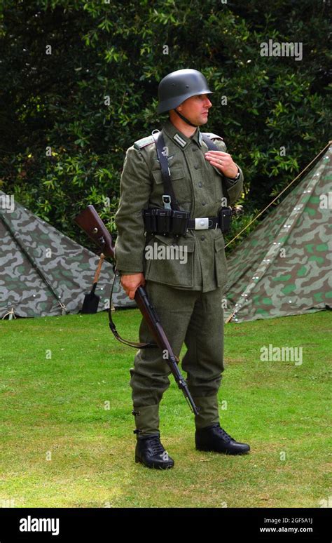 Infantryman from reenactment group in WW2 German uniform with Mauser Rifle Stock Photo - Alamy