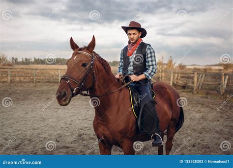 Cowboy Riding a Horse in Desert Valley, Western Stock Image - Image of revolver, riding: 133928303