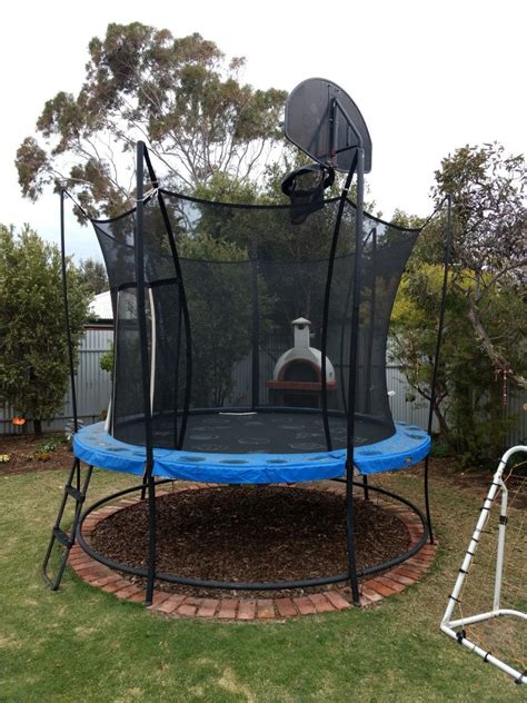 Backyard trampoline | Backyard playground, Garden trampoline, Backyard ...