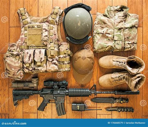 Set of Modern Military Equipment on Wooden Background Stock Image - Image of collimator ...