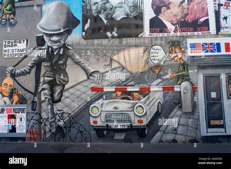 Graffiti on original section of Berlin Wall at the East Side Gallery in ...