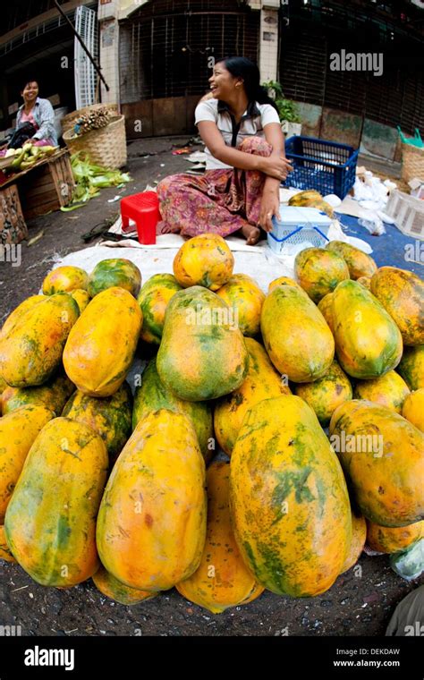 Papaya in yangon market, burma Stock Photo - Alamy