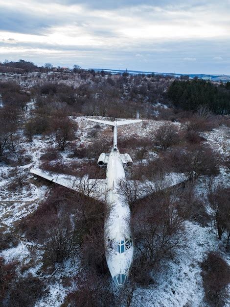 Premium Photo | Abandoned passenger plane wreck in the forest in winter