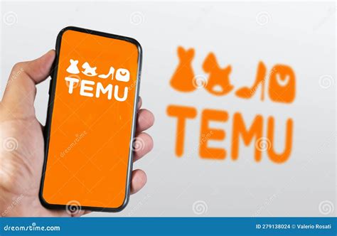 Hand Holding a Phone with Temu Logo Displayed on the Screen Editorial ...