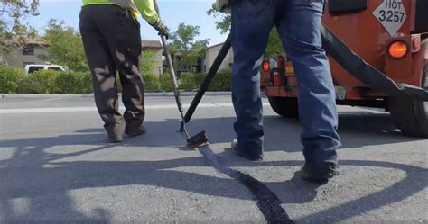 Slurry Seal for Sealing Roadways and Parking Lots - American Asphalt ...