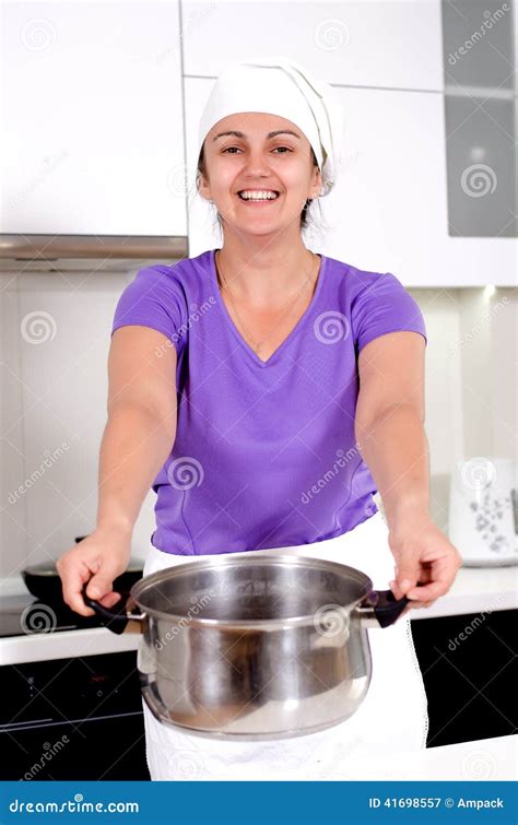 Laughing Attractive Cook with a Big Pot Stock Image - Image of house, happy: 41698557