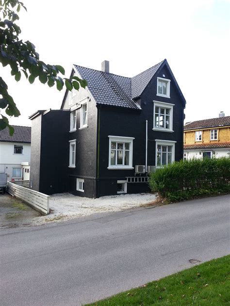 black house white trim Stavanger | Black house exterior, Colonial house exteriors, House exterior