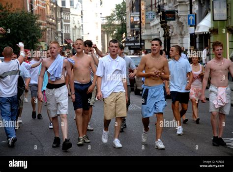 English football fans running through streets of central London after ...