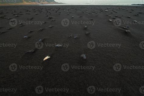 Close up black sand with basalt stones concept photo 16563086 Stock ...