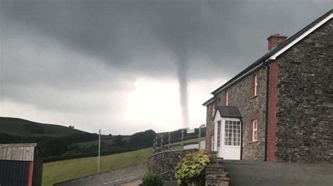 Tornadoes caught on camera across two counties in Wales - BBC News