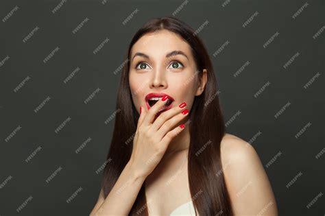 Premium Photo | Happy surprised woman on black banner background