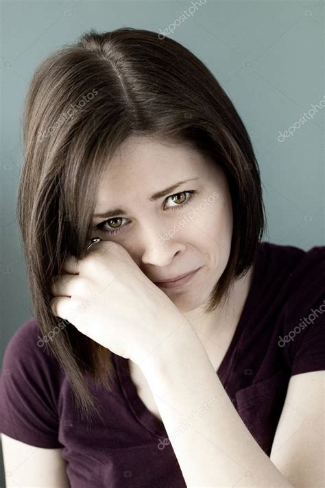 Sad young woman crying — Stock Photo © j0ycem #5599525