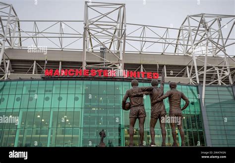 United Trinity statue featuring Manchester United legends George Best, Denis Law and Sir Bobby ...