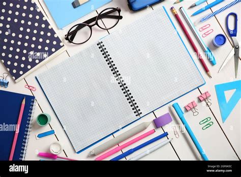 Flat lay of stationery on white wooden table background, copy space Stock Photo - Alamy